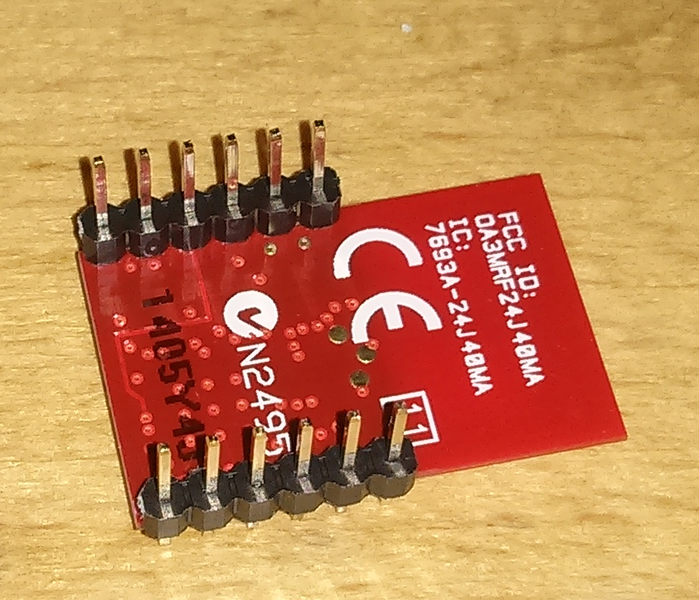 mrf24j40ma module with pin headers soldered to it